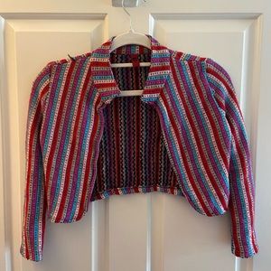 "Doll-like" cropped knit jacket.